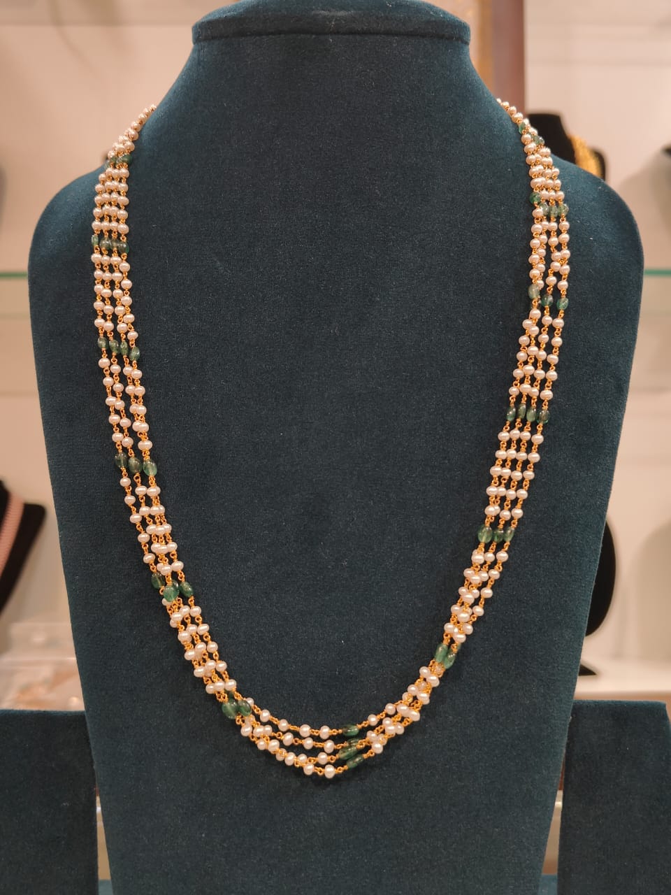 4 Lines Tharmala With Round Cultured Pearls and Real Emerald Beads view 1