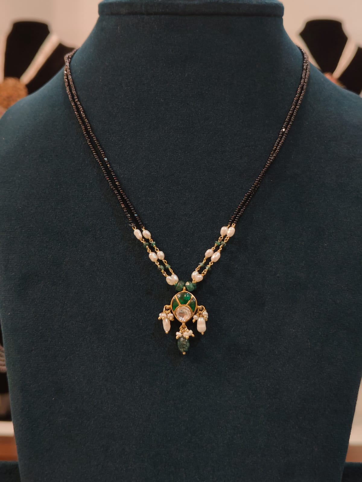Black Beads With Green Kundan Pendant 