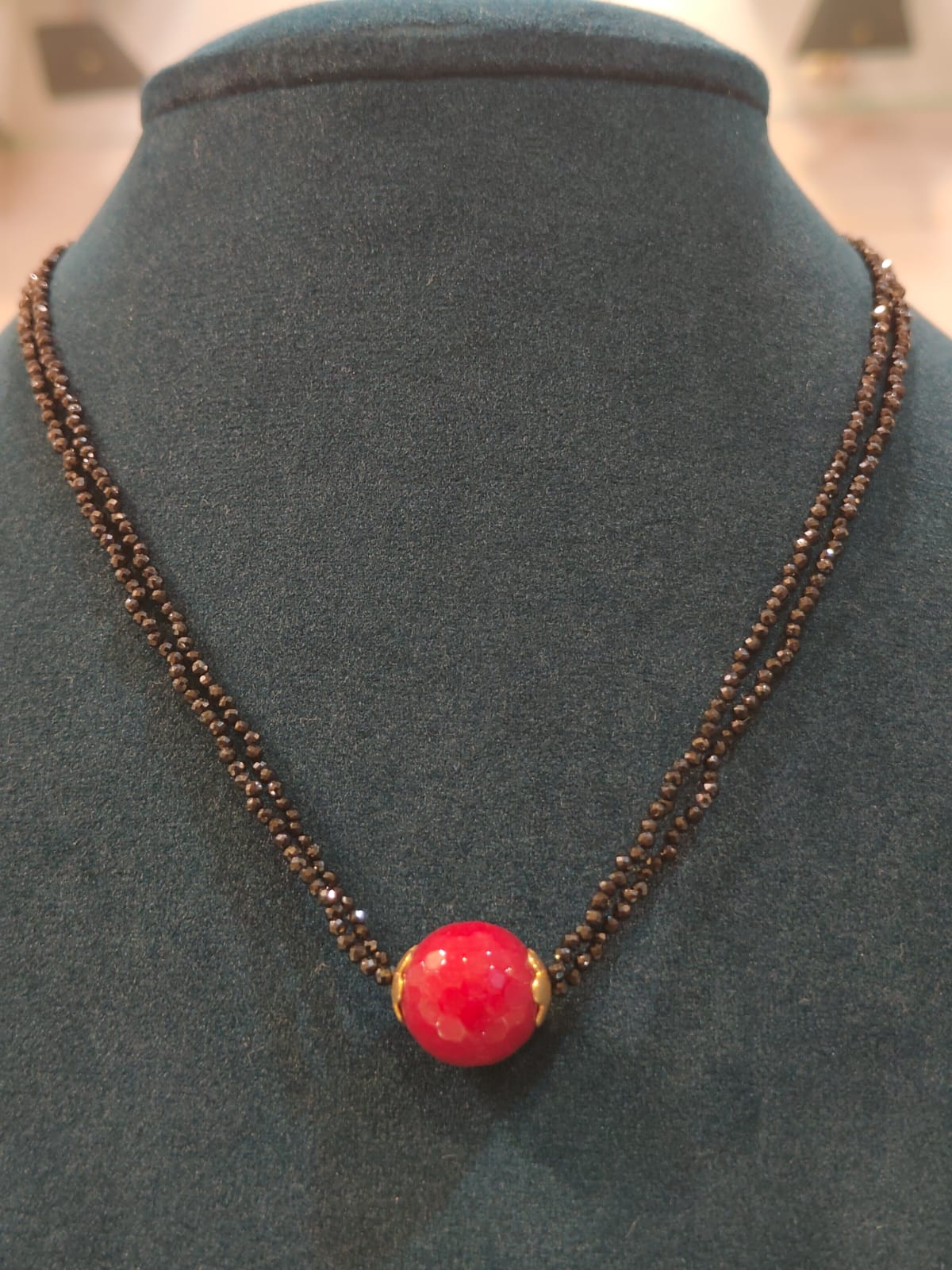 Black Beads With Ruby Bead